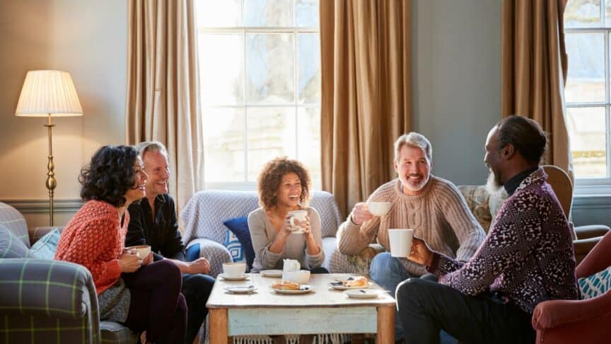 5 people having breakfast together